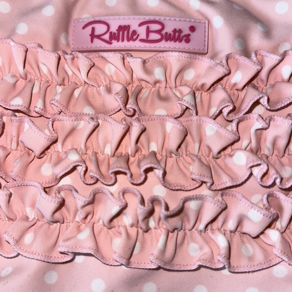 Ruffle Butts two-piece swimsuit. Size 7 children’s. Pink with white polka dots. - Picture 4 of 5